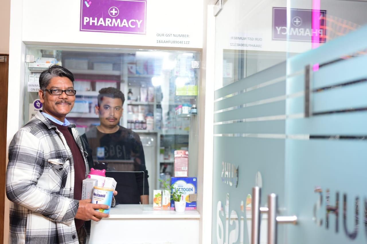 Pharmacy team at the counter — UHS Vista, Guwahati